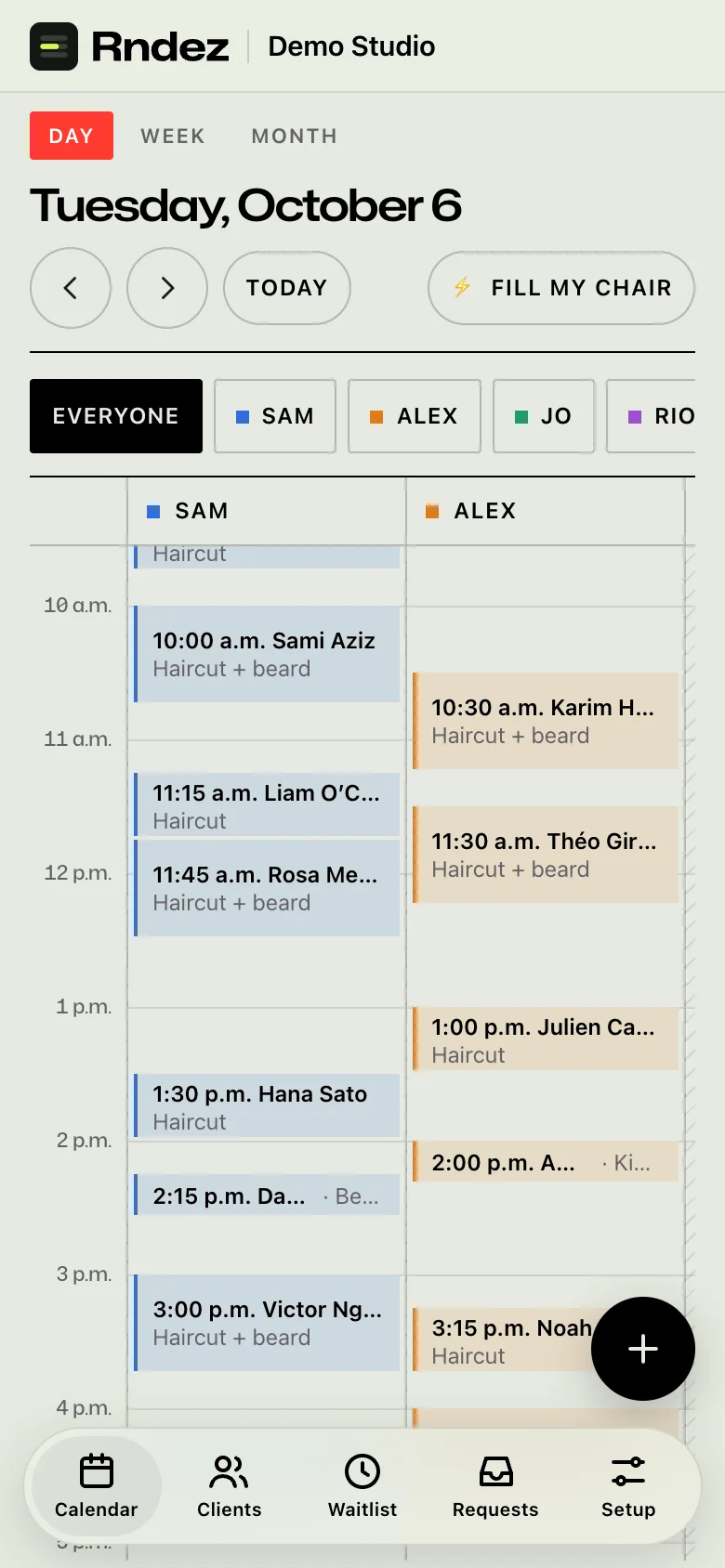 The owner dashboard Day view on a phone: one column per person and the bottom tab bar.